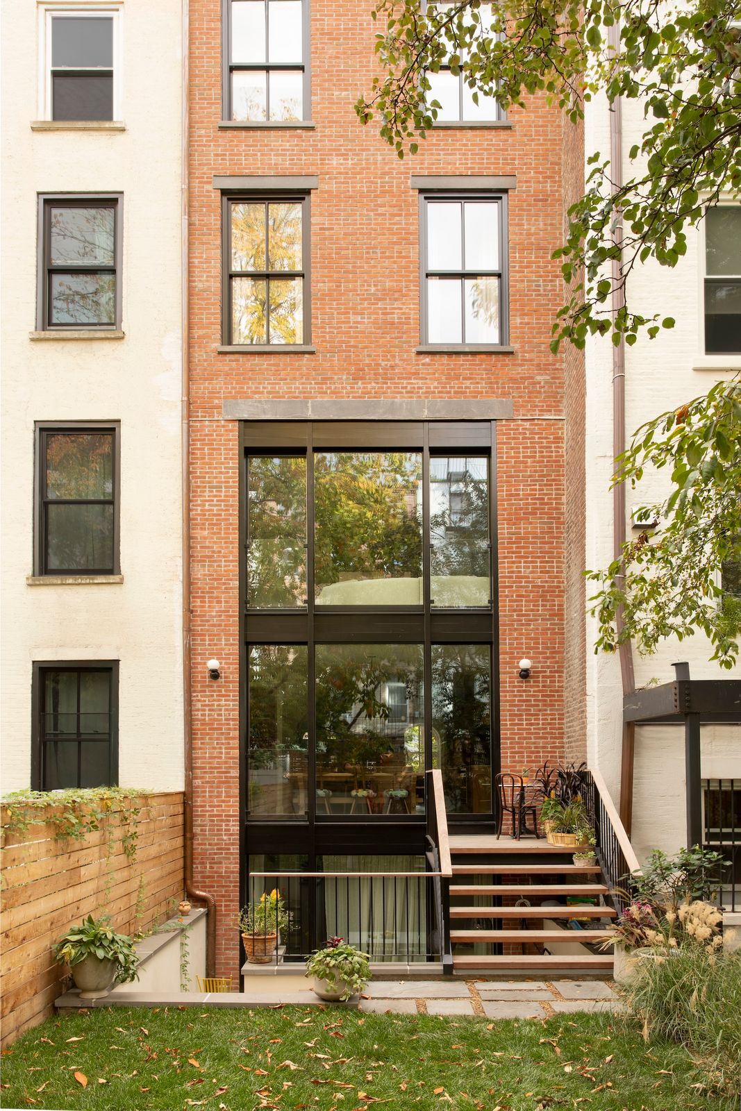 From the yard, the sunken seating space appears tucked away.