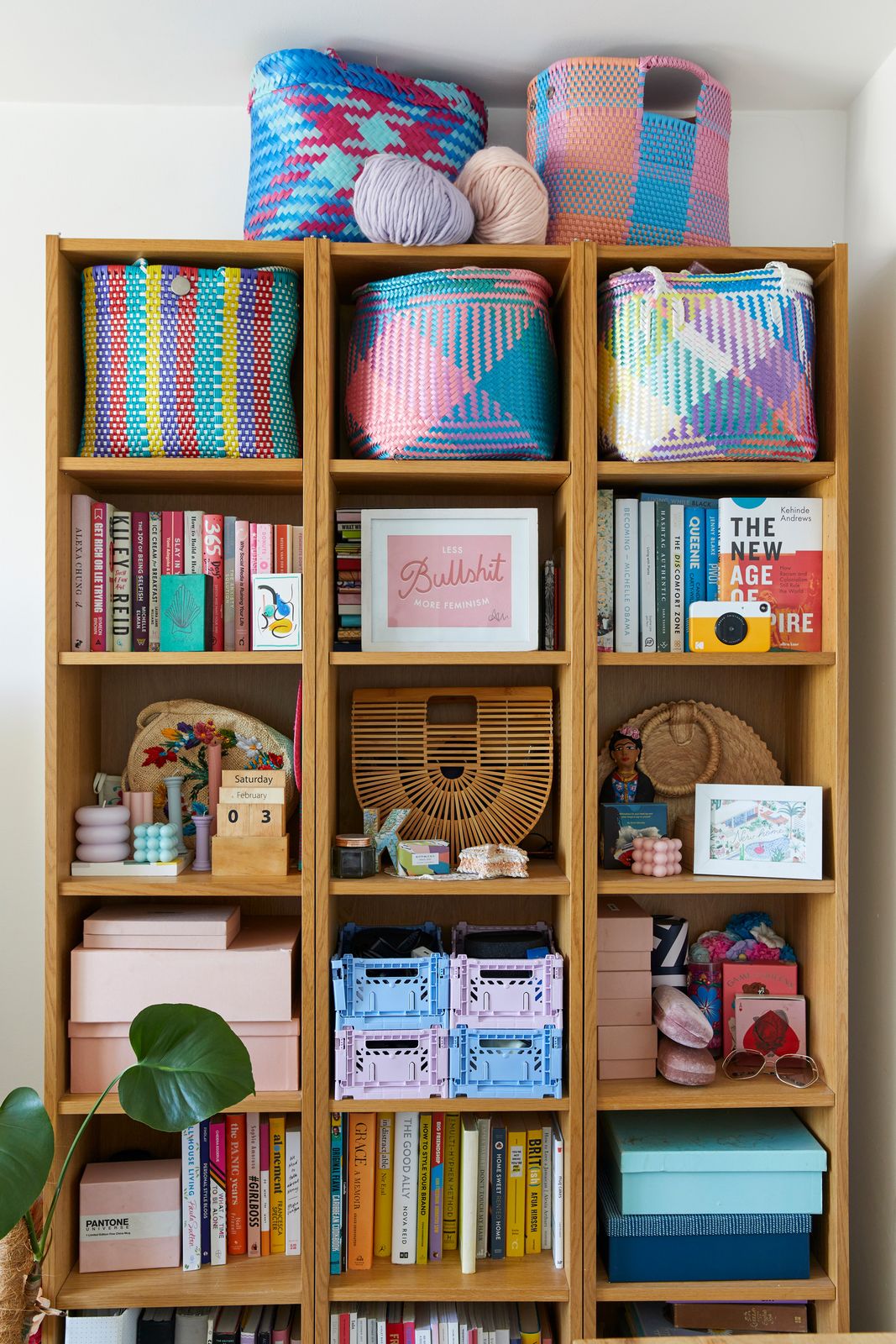 To help organize her storage, Kristabel paired colorful woven baskets from Mexico and Mauritius with pastel crates from HAY.