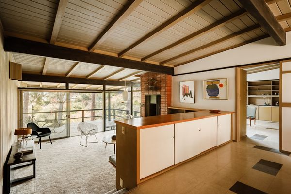 A split level separates the sunken living room from the rest of the common spaces.