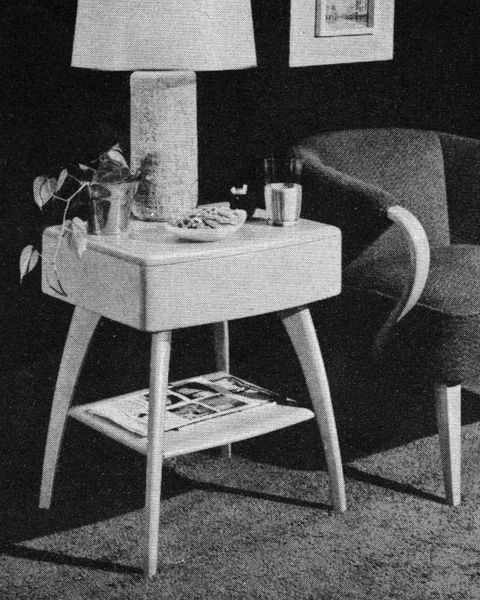 A 1950s catalog shows a room furnished with the M 166 Drop Leaf Table, as well as the M 154 A