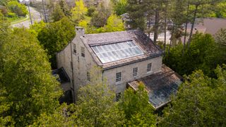This 19th-Century Mill in Ontario Comes With a Waterfall