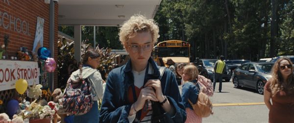 Teacher Justine, played by Julia Garner, is an obvious suspect when 17 children in a small suburban town go missing in the middle of the night.