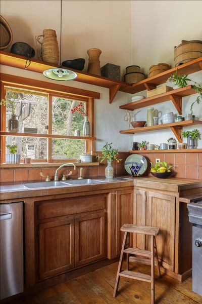 Open shelving displays vintage and antique Japanese pieces.