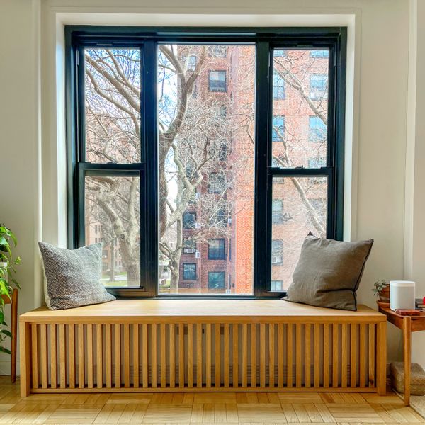The radiator is hidden but still functional—and now the clients can watch their neighborhood pass by in comfort.