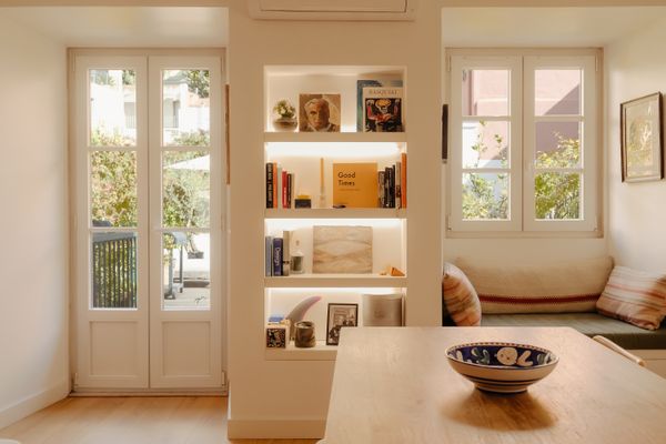 Throughout the house, custom oak carpentry provides storage and decor.