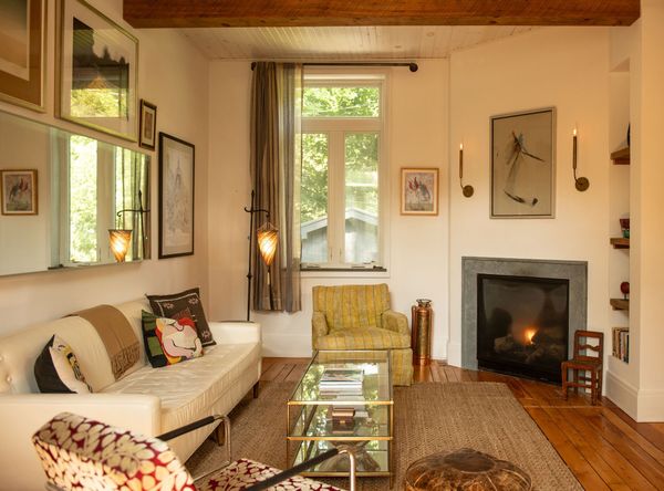 A gas fireplace keeps the living room cozy during the winter months.