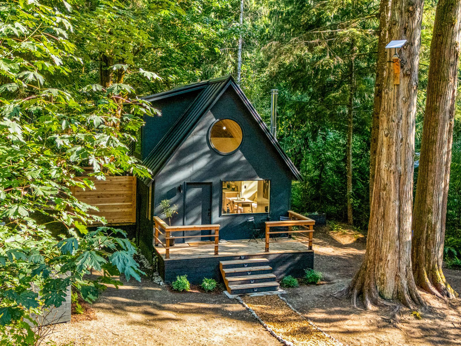 The fully furnished Scandinavian-style home comes with a firepit and easy access to the Cascade River.