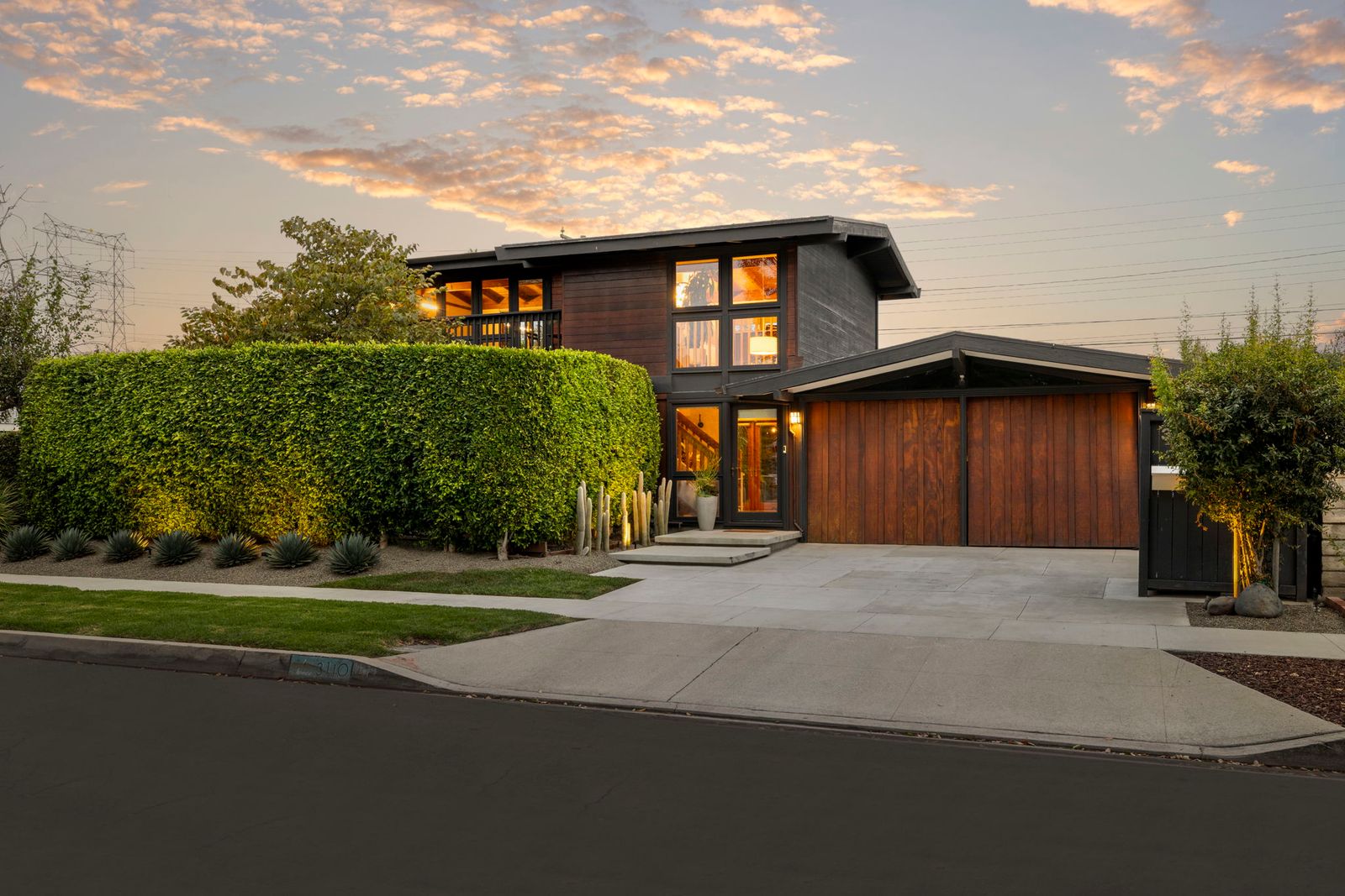The 1954 home was expanded before the City of Long Beach barred upper-level expansions in the Rancho Estates tract.
