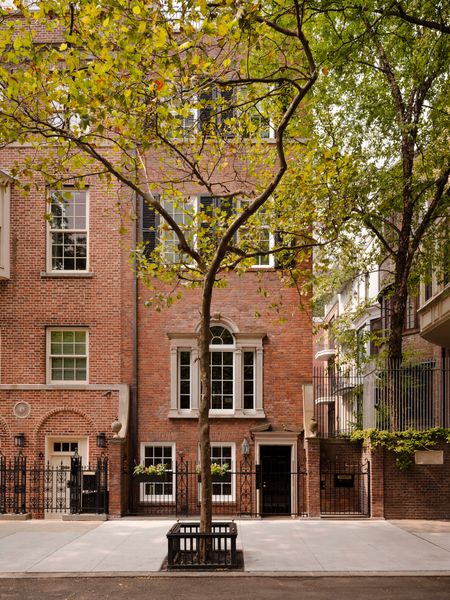 Originally built in the 1880s, the row house of architect Adrienne Brown and her husband, Jonathan Marcus, is among 14 in the ultra-elite New York City enclave formed in 1920 around a shared private garden facing the East River.