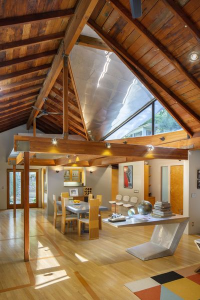 William Adams elevated one section on the roof in the renovation, allowing for huge diagonal skylights to brighten the main room.