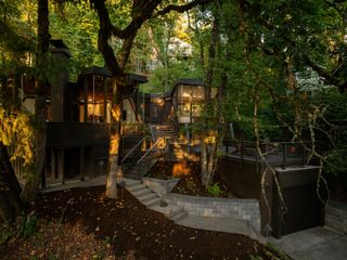 Massive Windows Fill This $1.1M Oregon Midcentury With Forest Views