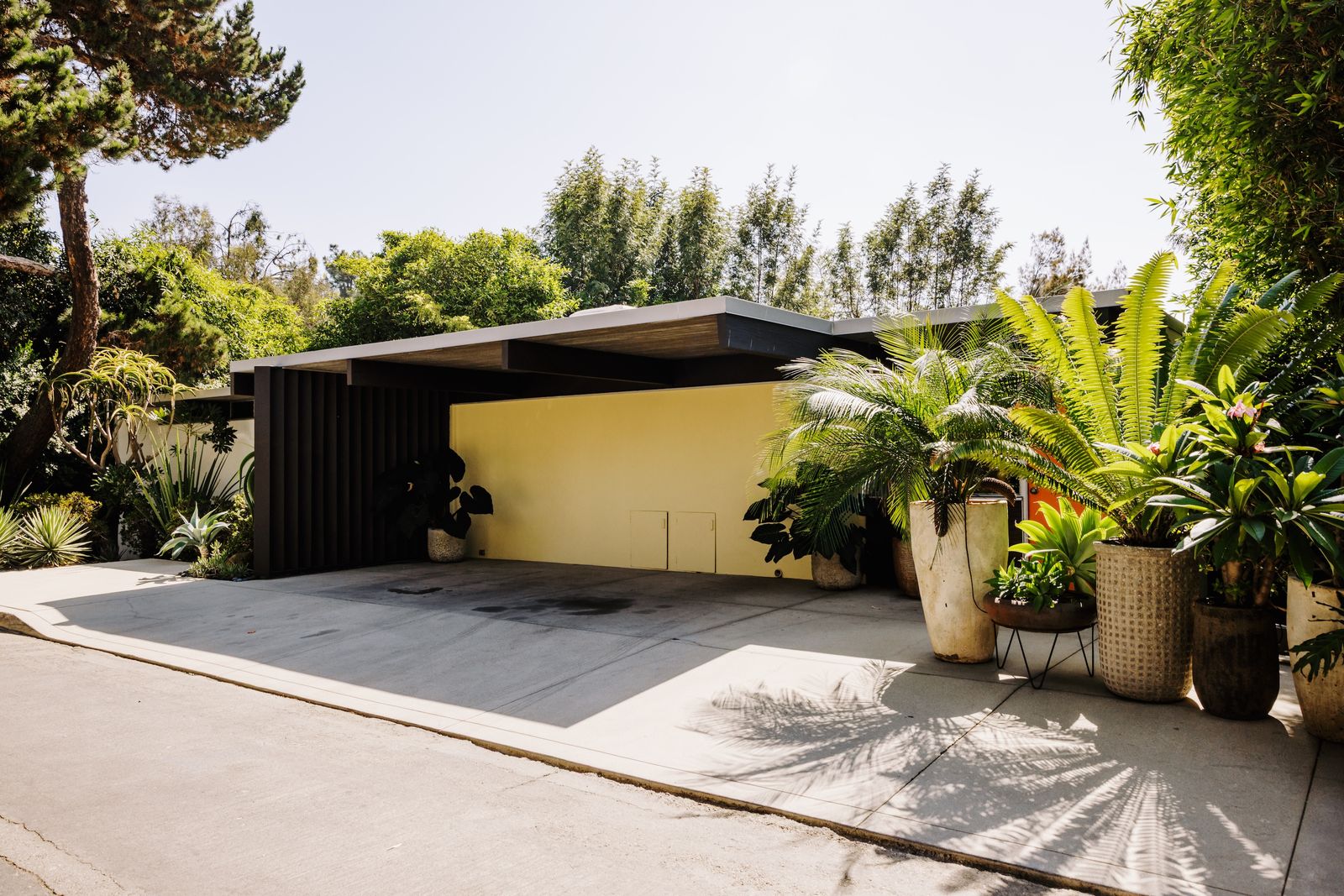 The Jason Hailey House has been meticulously restored in keeping with the architect’s vision—and it steps down a hillside with a series of lush outdoor spaces.
