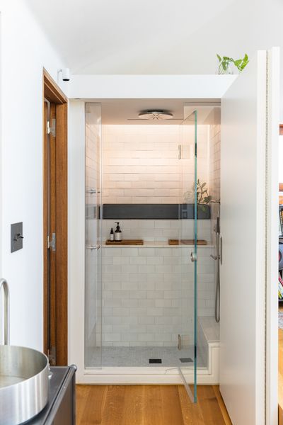 The library upstairs also includes a full bathroom, essentially transforming the upper level to a private space.