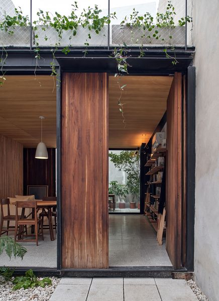 Across the entry courtyard and through a lapacho wood door is the living space, which was constructed using traditional methods.