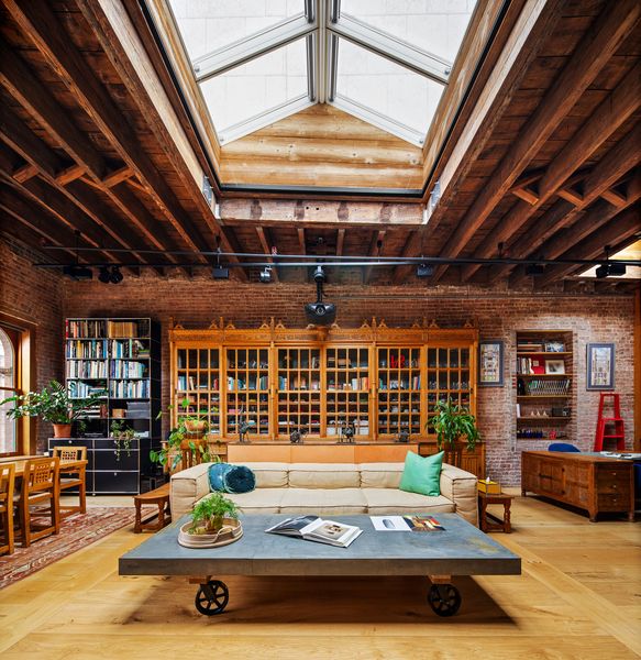 The architect stripped the sheetrock from the walls, exposing the apartment's brick and timber framing.