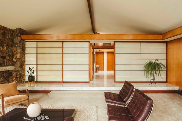 The home’s interiors are divided by translucent shoji screens with bamboo matrices.