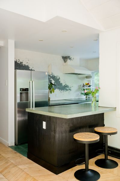 The flooring is made of one-inch thick reclaimed maple chevron floors.