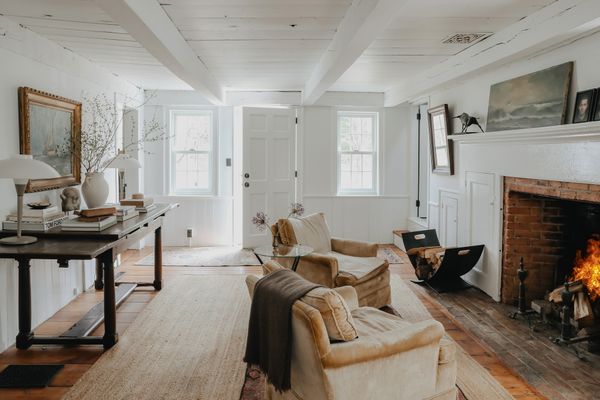 Both the front parlor and the dining room are home to wood-burning fireplaces.