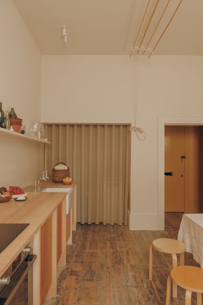 Instead of refinishing the floors in the kitchen which, like the rest of the flat, were hidden under wall to wall carpeting, the team lightly refinished them. The patina here is just traces of a particularly stubborn adhesive.