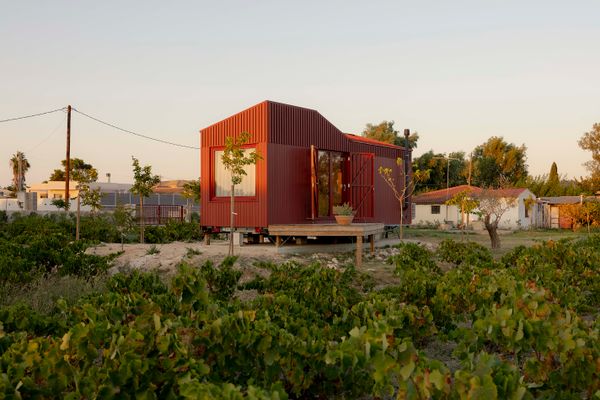 The 200-square-foot structure was built in Romania by Eco Tiny House and shipped to the island with furnishings and glazing already in place.