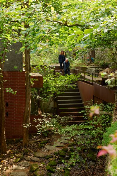 The couple took down boundary walls between the existing properties and created new pathways to connect them.