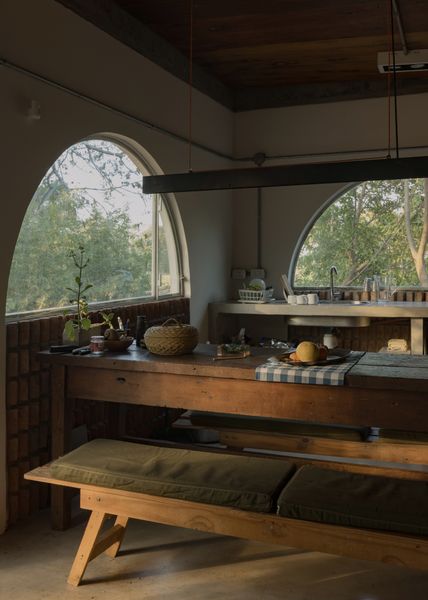 The kitchen walls are clad in brick set at an angle, a theme for the renovation.