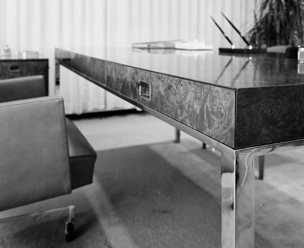 A detail of a burl table at Quaker Oats Company offices.