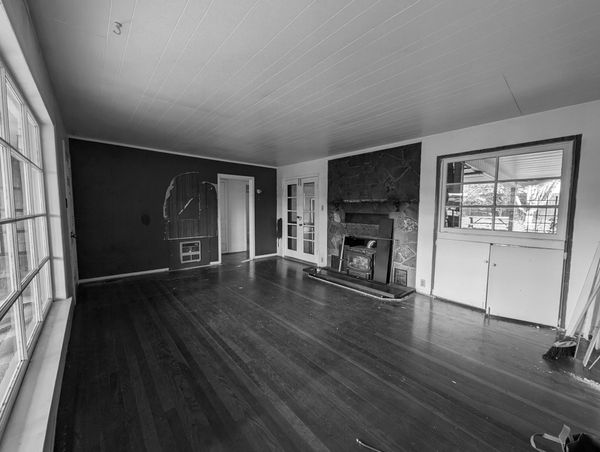 The low ceiling in the living room was vaulted to 12 feet to create a loftier feeling.