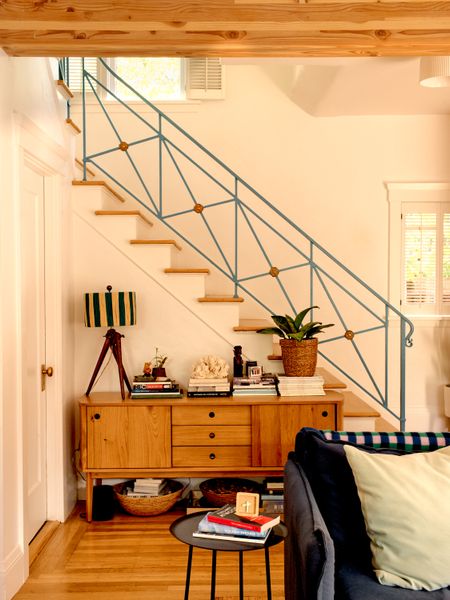 The Siegel Buffet credenza is from West Elm, and the Neva sofa is from Six Penny.