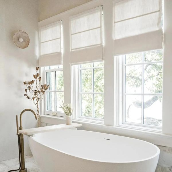 The motorized shades are operated with a wireless remote control, allowing you to open, close, or adjust your shades easily.