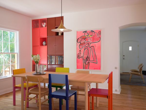 The dining room features colorful built-ins.