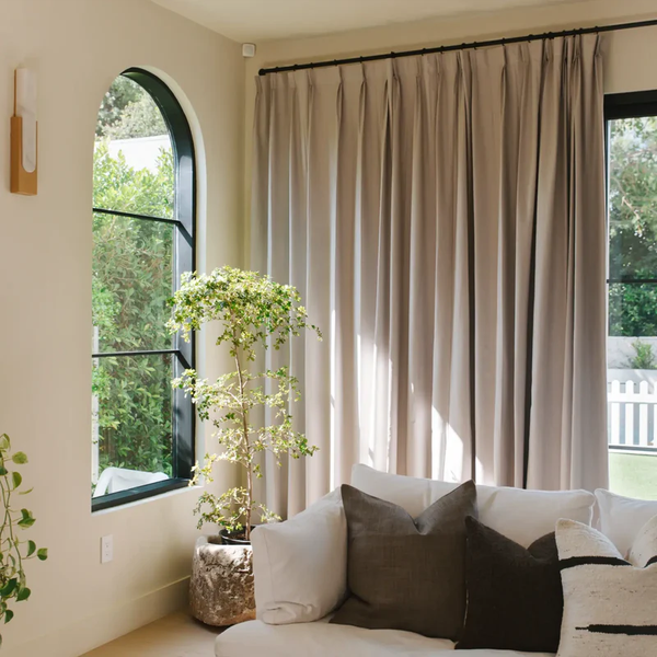 Heavyweight fabric provides light blocking, thermal insulation, and sound reduction.