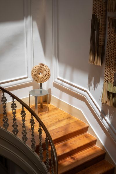 For the Cadeira chair, Macheia founders Papillo and Gayo collaborated with a blacksmith and a bunho artisan.