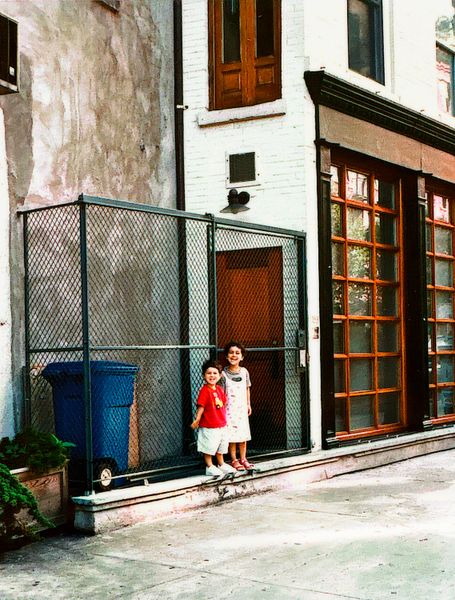 Ian and Emilia Petrarca in front of the Petrarcas’ triangular Tribeca town house in the mid-1990s.