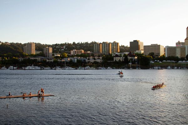 Swimmers on a dock on the Willamette River in Portland, Oregon.