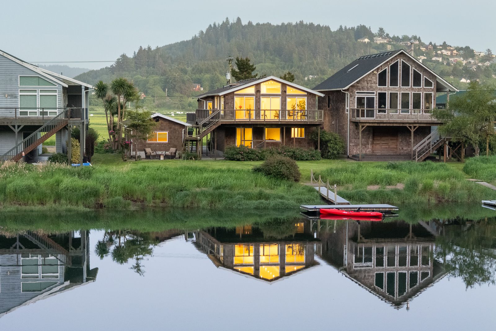 Renovated by Workaday Design, the waterfront retreat was made for stormy days by the fire and sunny afternoons spent mastering your kayak.