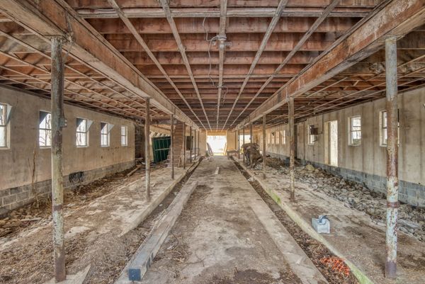 Before: The interior of the original barn.