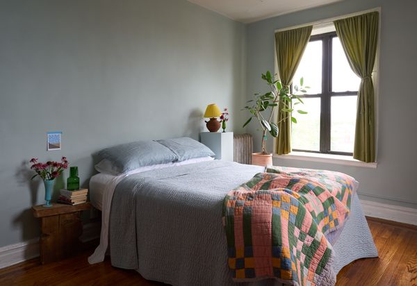 Renovating her Brooklyn rental gave Catherine Pearson a new appreciation for the Portieux Vallérysthal ceramics she’s collected over the year, like the one on her bedside table. The French brand is known for its distinctive blue glassware.