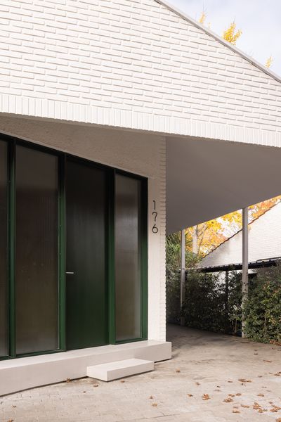 The 2,500-square-foot house, including its covered veranda, fits beneath a set of unusual rooflines, with two asymmetrical pitched planes that overlap.