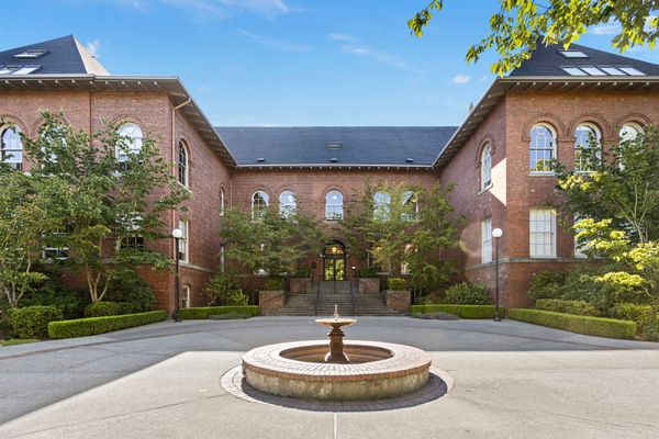 The one-bedroom, one-bathroom condo occupies a former elementary school classroom inside the West Queen Anne School, built in 1896.
