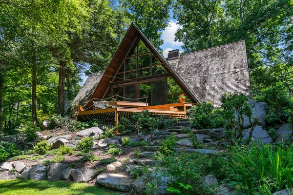 Built in 1966, the Woods Home sits on 6.74 wooded acres in Yorktown Heights, New York.
