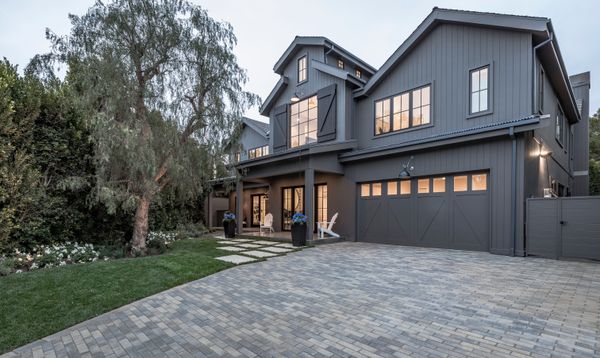 Hardie® Artisan® Siding boards are delivered to site smooth and primed for paint, allowing rich colors to further define a home’s gabled volumes.