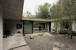 Near Lake Como, This €690K Concrete House Makes the Most of Its Narrow Site