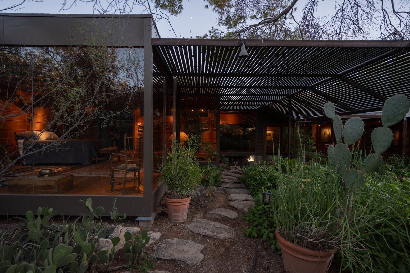 Over four decades, architect Ron Fridlind transformed a modest desert home into a tapestry of Japanese minimalism, landscaped courtyards, and sculptural oddities.