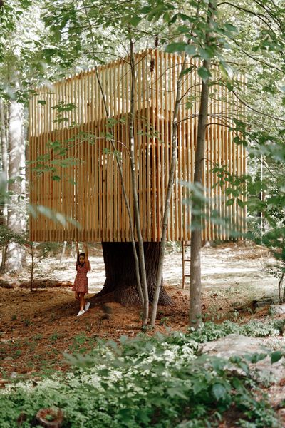 Audrey, age five, lets her imagination run wild in the tree house, says Ryan.