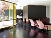 The 2008 remodeled completely redid the upstairs, where the master bed, TV room, living room, kitchen, bath, and small office are. Photo 7 of The Deam House modern home