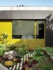 Jimo Thomas has been our gardener for years. I will post more updated images of the garden. It's grown a lot since this! Photo 8 of The Deam House modern home