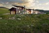 In response to the site’s challenges, the architects designed a low-slung structure anchored in concrete, steel and wood that clings to the base of a hillside. Photo 2 of Casper Residence modern home