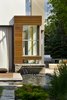 A water feature allows the patio and garden to float lightly. Photo 3 of Davis Residence modern home