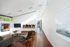 A tranquil seating area showcases the client's art and Mid-Century furniture classics. Photo 9 of Davis Residence modern home